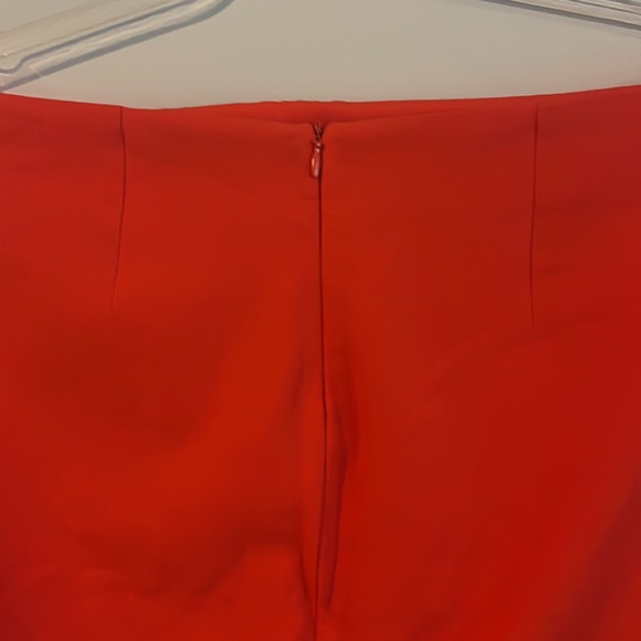 Beautiful mini skirt in a burnt orange with the front slit - Picture 5 of 6